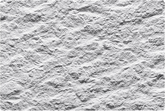Rock-Face Quarry Stone MCM flexible stone panel – Quarry Stone White colourway flat lay showing pale grey-white surface with large-scale irregular undulating rock-face relief replicating a hand-split quarry stone fracture surface