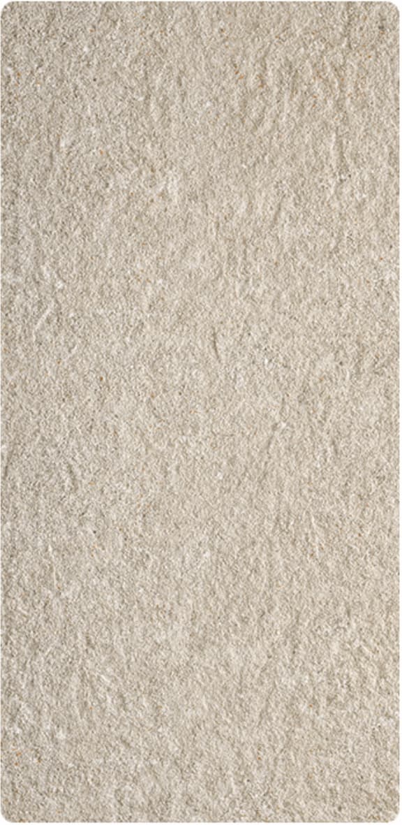 Desert Beige rough-faced granite flexible stone veneer – vertical panel view showing warm off-white beige surface with rugged chiselled texture and fine natural mineral variation, white background rounded corners
