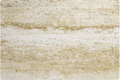 Earthy Stratum travertine flexible stone panel – Tuscan Gold variant, close-up flat lay showing warm cream-gold surface with bold horizontal earthy layering and natural pitted texture