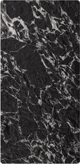 Veined Black Basalt flexible stone veneer – vertical panel view showing bold silver-white vein network on deep black rugged surface, dark background